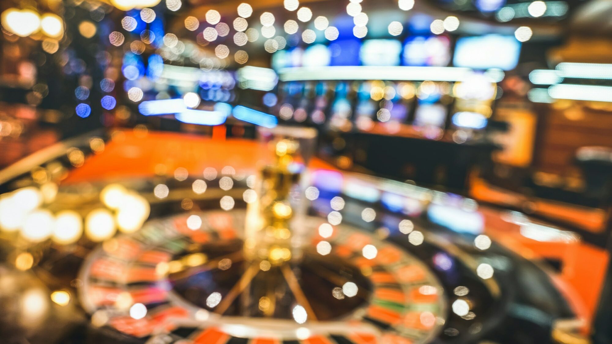 Blurred defocused background of roulette at casino saloon